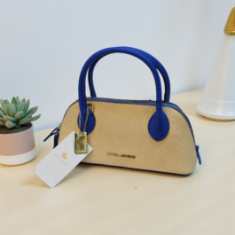 أناقة صيفية متفردة: شنطة يد عملية بتصميم عصري